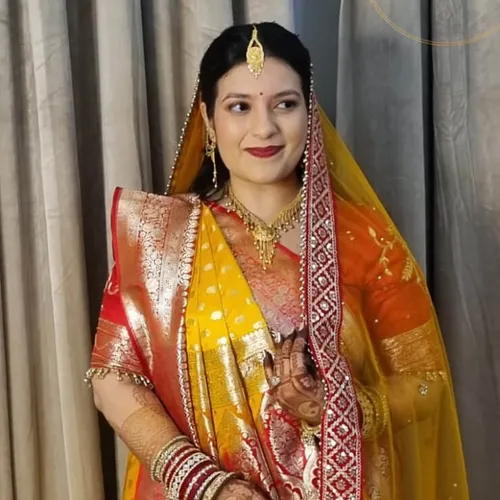 Bridal makeover in yellow and red Banarasi saree, Megha Makeover & Beauty Salon, Ahmedabad